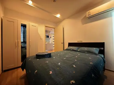 a bedroom with a bed in a room at BTS sukhumvit Line onnut station in Bangkok