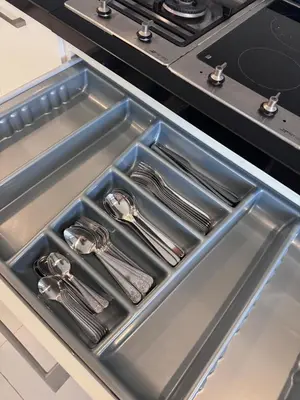 a metal kitchen sink with utensils in it at Central BKK Luxuxy Pool Villa 4BR in Bangkok