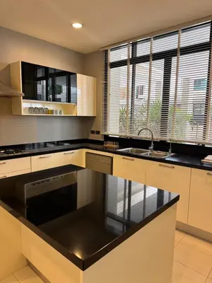 a kitchen with a sink and a stove at Central BKK Luxuxy Pool Villa 4BR in Bangkok