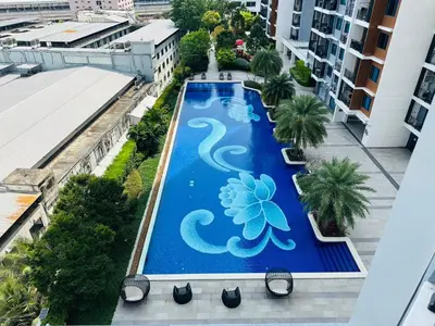 an overhead view of a swimming pool on a building at Artisan Ratchada Prime Studio Condos in Bangkok