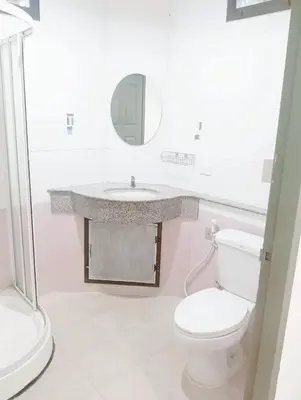 a white bathroom with a sink and a toilet at xx Mitr INN Sukhumvit 2 - BTS Nana มิตร อินน์ สุขุมวิทซอย 2 บีทีเอส นานา in Bangkok