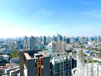 a view of a city skyline with buildings at Super City View Room, Swimming Pool,Gym,150m walk to BTS in Bangkok