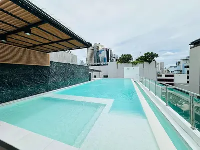 a swimming pool on the roof of a building at 6th Avenue Sukhumvit BKK 301 BTS Asoke Nana MRT in Bangkok