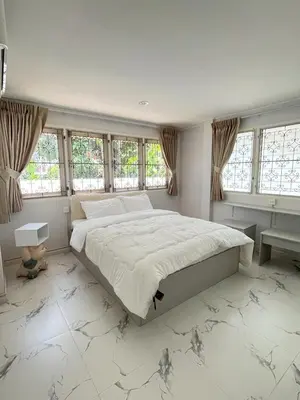 a bedroom with a large bed and windows at Near Airport 2nd room for 2,8K & 3rd for 1,8K & 4th only 300B INBOX! in Sathani Ban Hua Mak