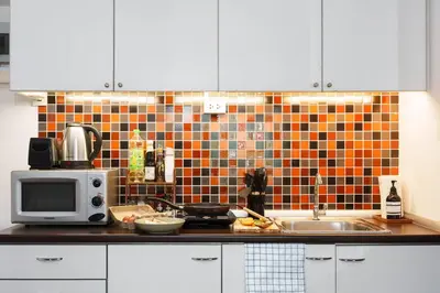 a kitchen with a sink and a microwave at King Bed, Park, BTS 5min | Free Parking, Fast WiFi in Khlong Toei
