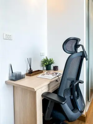 an office with a desk with a computer chair at Luxurious 2BR Ultra Fast Wifi Phrom Phong in Bangkok