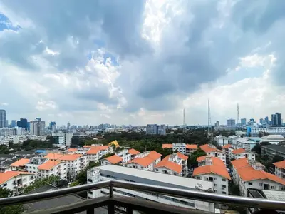 a view of a city with houses and buildings at Luxurious 2BR Ultra Fast Wifi Phrom Phong in Bangkok
