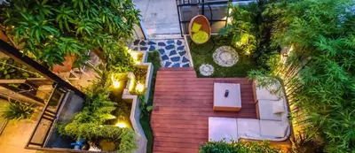 an overhead view of a garden with furniture and trees at Garden and pool Villa bangkok in Bang O