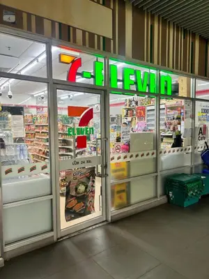 a store with the words jelani on the glass doors at Prime Near Sathorn Sukhumvit Central in Chong Nonsi