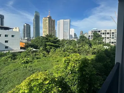a view of a city skyline with tall buildings at Brand new Condo near ICON SIAM in Bangkok