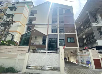 a building with a gate in front of it at NIJ Lady dorm in Bangkok