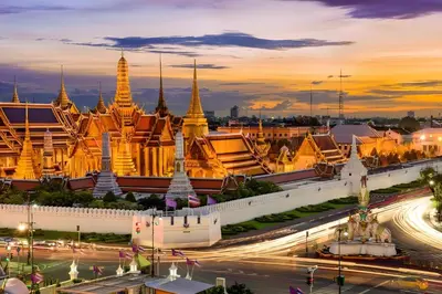 a view of the temple of emerald buddha at night at xx GO INN Khaosan BKK - โกอินน์ ข้าวสาร in Bang Bua Thong Railway Station