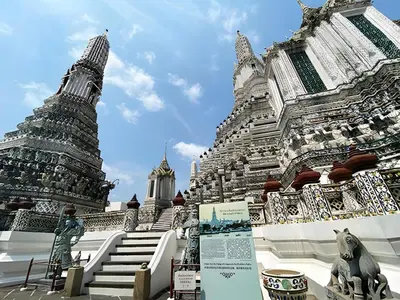 a large white building with two towers at xx GO INN Siriraj BKK โกอินน์ ศิริราช in Bangkok Noi