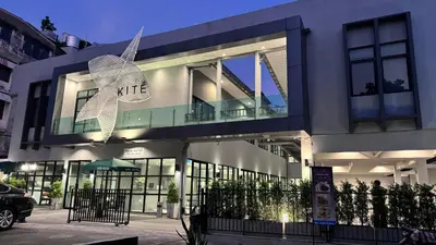 a building with a star on the side of it at The Kite Hotel Bangkok in Bangkok