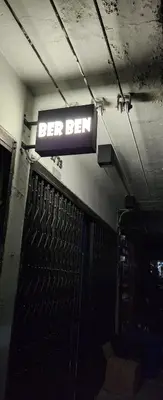 a sign for a beer bar on the wall of a building at Ber Ben House in Bang Su