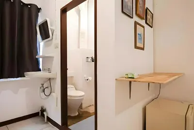 a bathroom with a toilet and a sink at xx GO INN Asiatique BKK - โกอินน์ เอเชียทีค เจริญกรุง in Godown