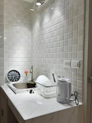 a kitchen counter with a toaster and a sink at MoonStay C1 Impact Arena Muangthongthani-Donmuang-FreeSpeedWifi in Nonthaburi