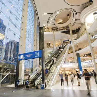 a group of people walking in a shopping mall at Executive Suite 2 Beds Nana BTS 5 mins in Bangkok