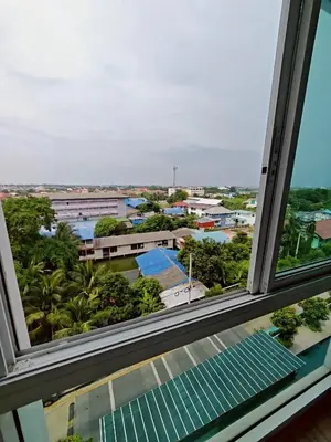 a view of a city from a window at Laid back at IRIS Westgate Bangkok-Nonthaburi in Ban Bang Phai
