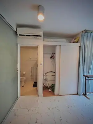 an empty room with a bathroom and a toilet at Modern Condo with Full Amenities Bangkok in Sathani Ban Hua Mak