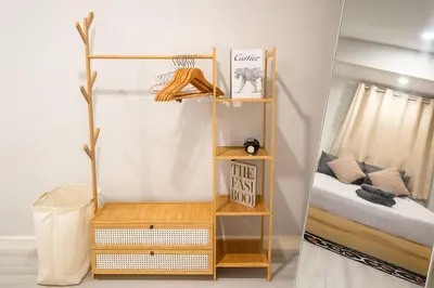 a room with a bunk bed and a shelf at Lovely Townhome in Shopping District near BTS&MRT in Bang Su