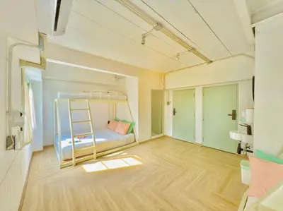 a small room with a bunk bed in it at Bangkok Group Bunk Hotel Khaosan in Bangkok