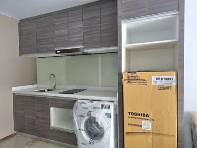 a kitchen with a sink and a box next to it at Lummpni palace in Ban Bang Toei (1)