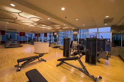 a gym with treadmills and exercise equipment in a building at Supalai Wellington 2 Near MRT in Bangkok