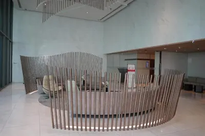 a room with chairs and a table in a building at Luxury room close to BTS in Bangkok