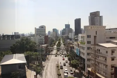 a view of a city with cars on a street at Bangkok Place Apartment - EKAMAI BTS in Bangkok