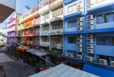 a group of colorful buildings in a city at Cloud no 5 Generous space Green n Quiet Heart BKK in Bangkok