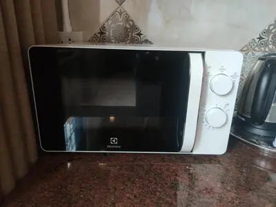 a microwave sitting on top of a counter at SKY 6 The Perfect Quiet Oasis BKK Center Near MRT in Bangkok