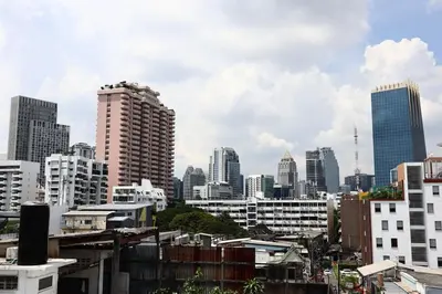 a view of a city skyline with tall buildings at SKY 10 Convenient near Lumphini Park and MRT in Bangkok