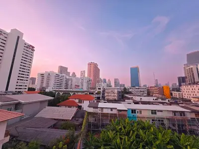 a view of a city with tall buildings at Crane nest 14 loft with views over Sathorn in Bangkok