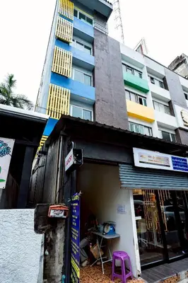 a building with a purple stool in front of a building at XX Oh My Nap Nana Soi 3 - BTS Nana in Bangkok