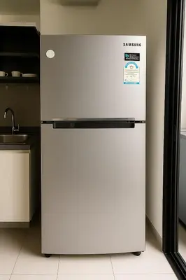 a refrigerator is sitting in a kitchen at 1 Bedroom Bangkok Skyline View Apartment At ON-NUT in Bangkok