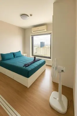 a bedroom with a bed and a large window at Skyline View 1 Bedroom Near RCA, Thonglor And Nana in Bangkok