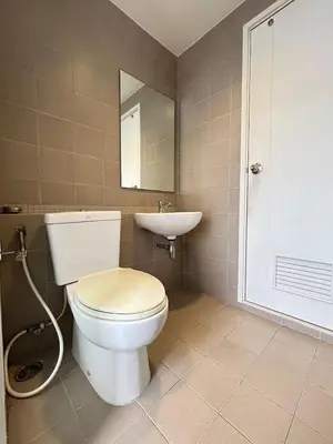a bathroom with a toilet and a sink at Skyline View 1 Bedroom Near RCA, Thonglor And Nana in Bangkok