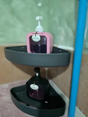 a bathroom sink with a pink suitcase in it at 100 Luxury Studio Apartment with private balcony in Bangkok