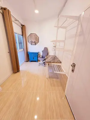 an empty room with a desk and a shelf at Crane nest 6 Townhouse View in Bangkok