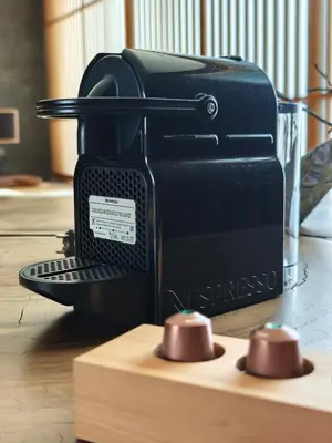 a black toaster sitting on top of a table at Japanese Style 1-Bedroom 162m BTS Thonglor-Ekmai \u7af9 \u30ec\u30b8\u30c7\u30f3\u30b9 in Bangkok