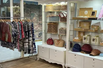 a retail store with a lot of clothes and baskets at Suan Sunandha Palace Hotel in Bangkok