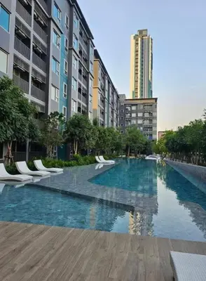 a swimming pool in the middle of a city with buildings at High Floor Luxury Studio with Great Views in Sathani Ban Hua Mak