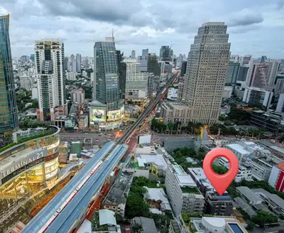 a red marker in a city with buildings at Best City Location with 3-min Walk to Everything in Bangkok