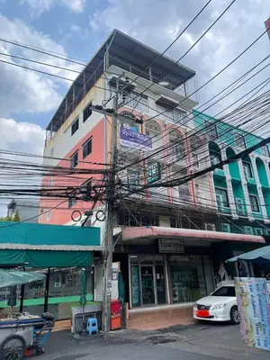 a building with a lot of wires on it at GO Inn Rama 3 BKK - โกอินน์ พระราม 3 in Bang Khlo