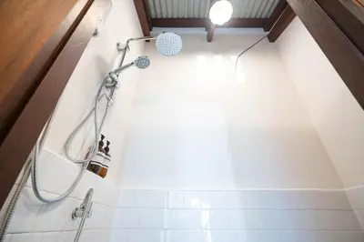 a bathroom with a shower in a room at Baan Lek Tee 6 - 9Chinatown near Yaowarat and MRT in Bangkok
