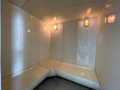 an empty room with two lights on the wall at Functional and comfortable-FastWiFi-MRT HuaiKhwang in Bangkok