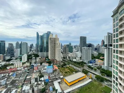 an aerial view of a city with tall buildings at Loft style Large 69 SQMFast WiFi BTS Chong Nonsi in Bangkok