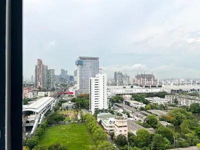 a view of a city with tall buildings at Cozy Park-view 1BR - Ultra Fast Wifi - BTS Bangna in Bangkok
