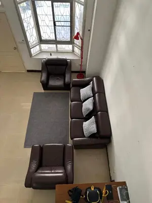 a living room with a couch and two chairs at Bangkok Halwa home in Sathani Ban Hua Mak